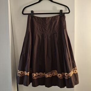Miss Tina Women's Brown Pleated Skirt with Gold Chain Detail